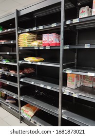 Cape Town, South Africa - March 24, 2020: Food Shelves Inside A Grocery Store With Very Little Stock. Coronavirus (covid-19) Panic Buying Concept Image.  