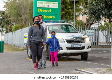 Cape Town, South Africa - May 2020: Beautiful, Vibrant African Family Exercising In The Morning Wearing Face Mask During Corona Virus Pandemic In Africa