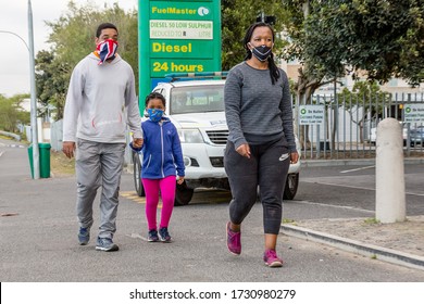 Cape Town, South Africa - May 2020: Beautiful, Vibrant African Family Exercising In The Morning Wearing Face Mask During Corona Virus Pandemic In Africa