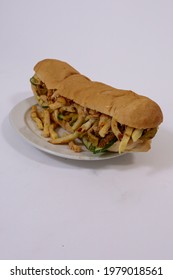 Cape Town, South Africa - May 2021: South African Gatsby. Masala Steak Gatsby With Coca Cola. Traditional Cape Malay Food.