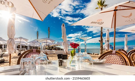 Cape Town, South Africa - May 12, 2022: Table Setting At Grand Africa Cafe And Beach Bar Restaurant