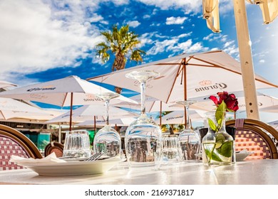 Cape Town, South Africa - May 12, 2022: Table Setting At Grand Africa Cafe And Beach Bar Restaurant