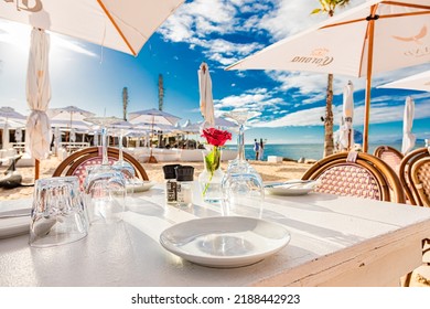 Cape Town, South Africa - May 12, 2022: Table Setting At Grand Africa Cafe And Beach Bar Restaurant