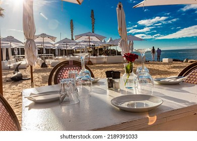 Cape Town, South Africa - May 12, 2022: Table Setting At Grand Africa Cafe And Beach Bar Restaurant