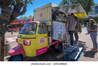 Cape Town South Africa October 6th 2017. Fast Food Outlets. People Queuing And Buying Fast Food From A 3 Wheeled Tuk Tuk Van In A Cape Town Street. 