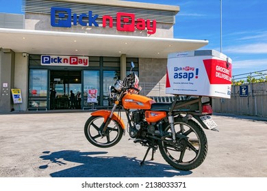 Cape Town, South Africa - September 9, 2021: Express Service Delivery Bike Parked Outside Local Pick N Pay Grocery Store