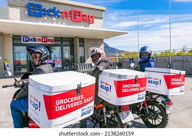 Cape Town, South Africa - September 9, 2021: Express Service Delivery Bikes With African Riders Outside Local Pick N Pay Grocery Store