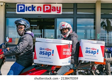 Cape Town, South Africa - September 9, 2021: Express Service Delivery Bikes With African Riders Outside Local Pick N Pay Grocery Store