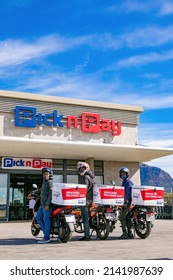 Cape Town, South Africa - September 9, 2021: Express Service Delivery Bikes With African Riders Outside Local Pick N Pay Grocery Store