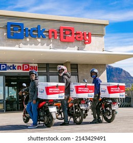 Cape Town, South Africa - September 9, 2021: Express Service Delivery Bikes With African Riders Outside Local Pick N Pay Grocery Store