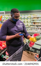 Cape Town, South Africa - September 9, 2021: Staff Member Picking Products From Shelf For Express Home Delivery Service