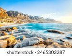 Cape Town Sunset over Camps Bay Beach with Table Mountain and Twelve Apostles in the Background, South Africa