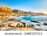 Cape Town Sunset over Camps Bay Beach with Table Mountain and Twelve Apostles in the Background, South Africa 