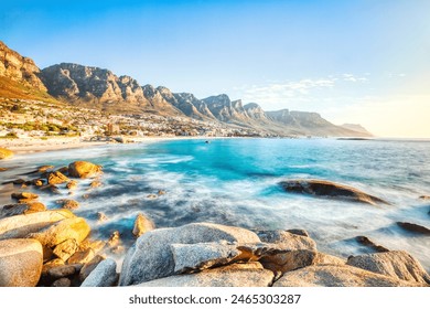 Cape Town Sunset over Camps Bay Beach with Table Mountain and Twelve Apostles in the Background, South Africa - Powered by Shutterstock