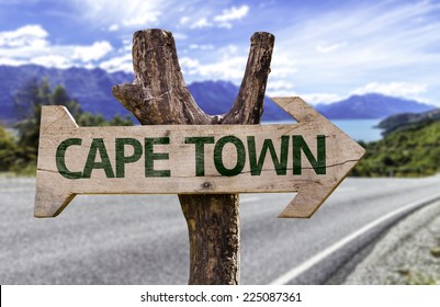 Cape Town Wooden Sign With A Beach On Background