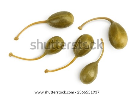 Capers isolated on white background. Pickled or canned capers. Top view. Flat lay