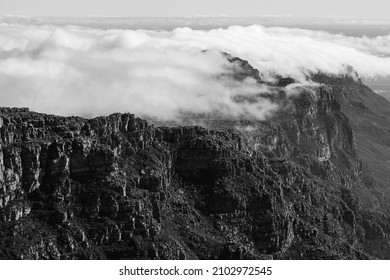 CAPETOWN, SOUTH AFRICA - Nov 22, 2021: A beautiful shot of a seascape in Capetown, South Africa in grayscale
