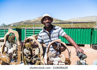 CAPETOWN, SOUTH AFRICA - Nov 22, 2021: A black male selling stuff on the road in Capetown, South Africa