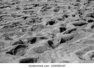 CAPETOWN, SOUTH AFRICA - Nov 22, 2021: A closeup shot of gray sand at the beach of Capetown in South Africa