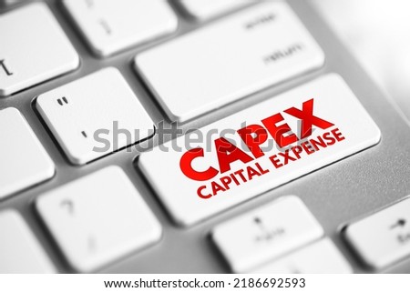 CAPEX Capital Expense - money an organization or corporate entity spends to buy, maintain, or improve its fixed assets, acronym text concept button on keyboard