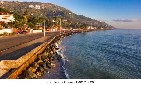 CAP-HAITIEN, HAITI - JANUARY 14, 2019: The iconic waterfront boulevard of Cap-Haitien, a popular locale for both locals and tourists alike.     