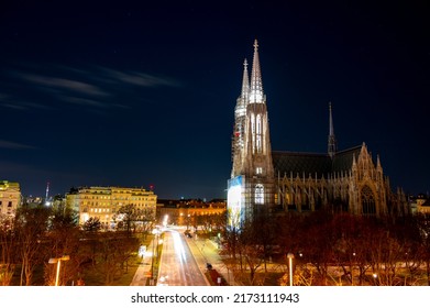 Capital Of Austria Vienna At Night, View On Gothic Church And Streets Of Old City