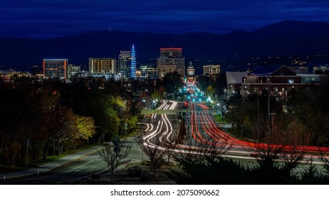 Capital Boulevard streaking car lights night with Boise Skyline
