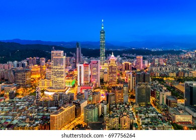 Capital city of Taiwan with view of prominent Taipei 101 Tower and busy street in Xinyi Financial District 