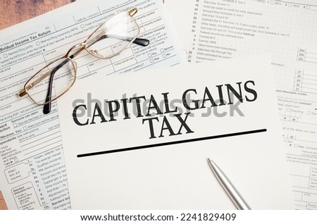 CAPITAL GAINS TAX, business concept image with soft focus background and vintage tone