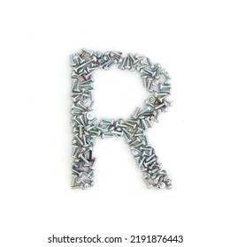 Capital Letter R Made From Screws And Bolts. Alphabet Made From Used Screws. White Background. Industrial Bolt Font