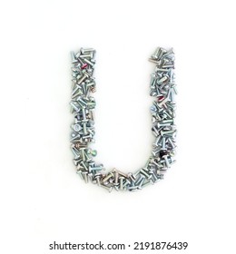 Capital Letter U Made From Screws And Bolts. Alphabet Made From Used Screws. White Background. Industrial Bolt Font