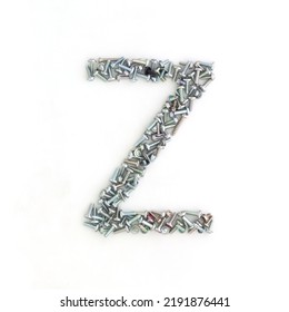 Capital Letter Z Made From Screws And Bolts. Alphabet Made From Used Screws. White Background. Industrial Bolt Font