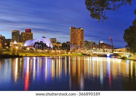 Capital of SOuth Australia - Adelaide city CBD at sunrise reflecting in still waters of torrens river