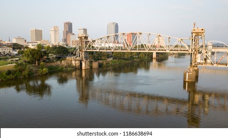 The Capitol City Of Arkansas In Little Rock Is Behind The Transformed Railroad Bridge