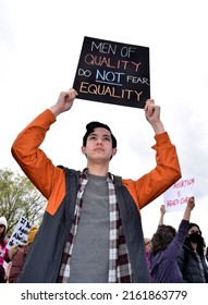 Capitol Hill, Seattle, WA - May 14, 2022: Young Male Rally Participant Showing Protest Sign.