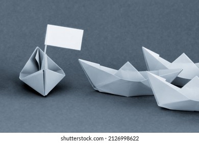 Capitulation, Defeat Concept. Attack, Aggression Concept.  Paper Boats. Color Ships 