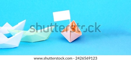 capitulation, defeat concept. attack, aggression concept.  Paper Boats. color ships 