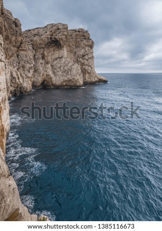 Similar – Cape with cliffs and sea