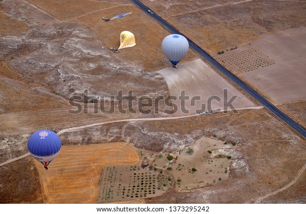 Cappadocia,\
Turkey - August 27 2018: Hot balloon landing\
