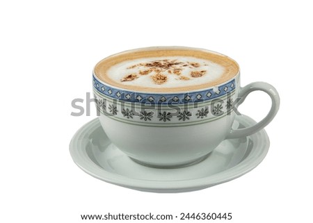 Cappuccino or latte with frothy foam, blue coffee cup top view closeup isolated on white background. Cafe and bar, barista art concept.