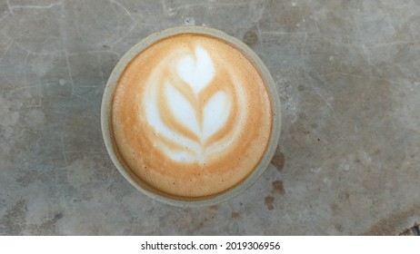 Cappuccino On A Porcelain Mug With Flower Latte Art For Breakfast Menu Set