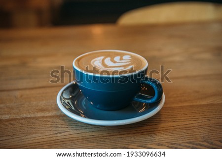 Cappuccino on table in a cafe