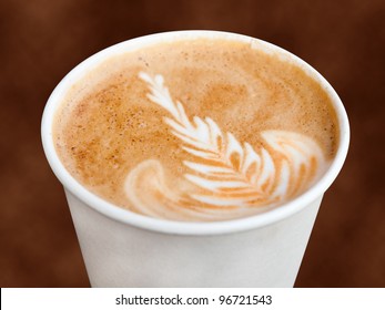 Cappuccino in a takeaway cup - Powered by Shutterstock