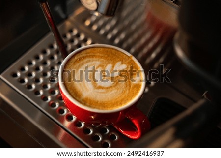 Cappucino and latte on a cup in the caffe