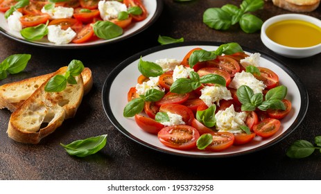 Caprese Salad With Cherry Plum Tomatoes, Mozzarella Cheese And Basil. Healthy Vegetarian Food