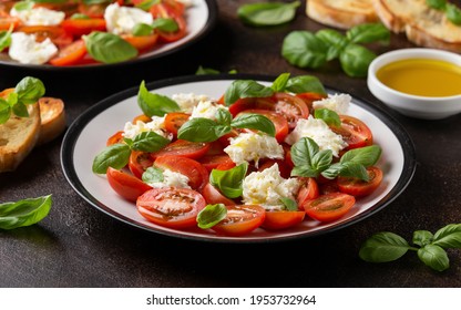 Caprese Salad With Cherry Plum Tomatoes, Mozzarella Cheese And Basil. Healthy Vegetarian Food