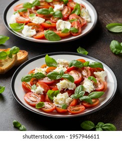 Caprese Salad With Cherry Plum Tomatoes, Mozzarella Cheese And Basil. Healthy Vegetarian Food