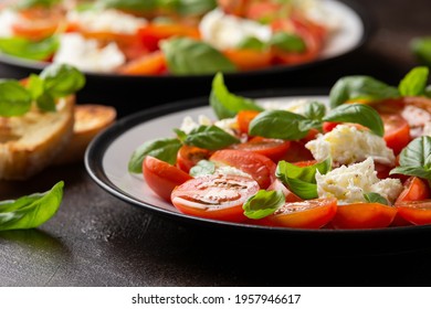 Caprese Salad With Cherry Plum Tomatoes, Mozzarella Cheese And Basil. Healthy Vegetarian Food