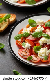 Caprese Salad With Cherry Plum Tomatoes, Mozzarella Cheese And Basil. Healthy Vegetarian Food