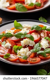 Caprese Salad With Cherry Plum Tomatoes, Mozzarella Cheese And Basil. Healthy Vegetarian Food